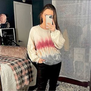 16. cream and tie dye sweatshirt with bubble sleeves